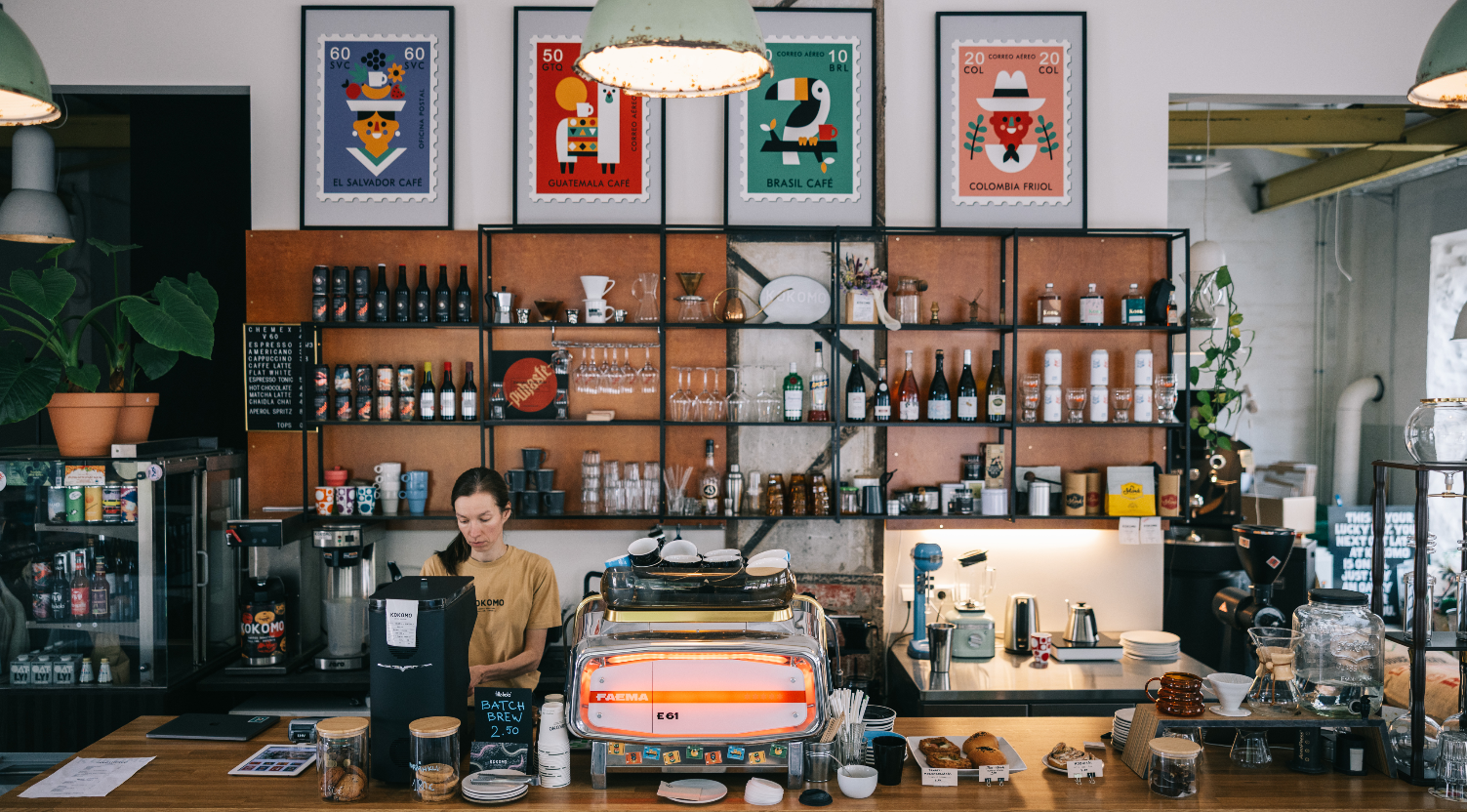 Cafe bar with coffee equipment and beans